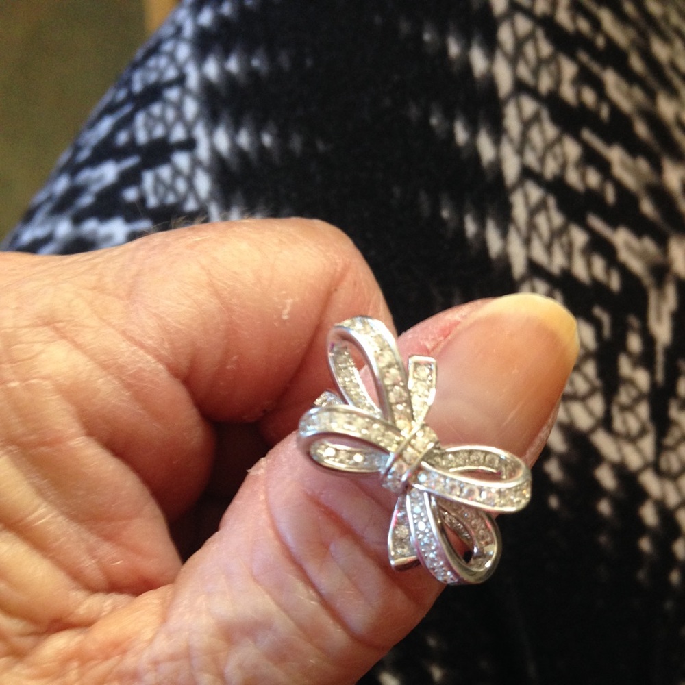 Silver bow ring.
